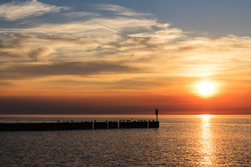 Fototapeta na wymiar The colors of the sunset over the Baltic Sea