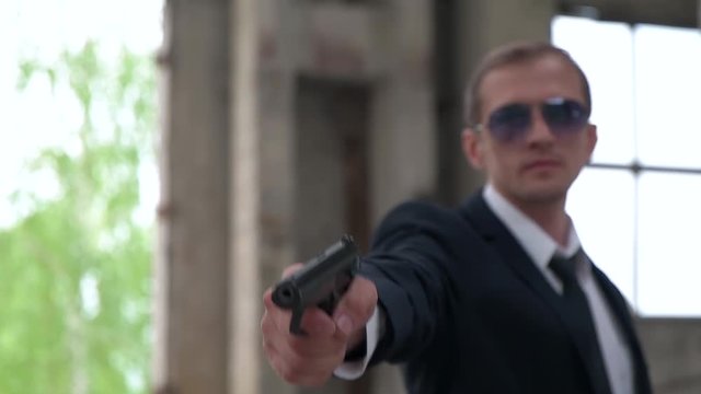 killer shoot in an abandoned building