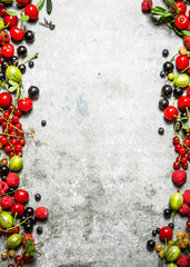 Fresh berries on a stone background.