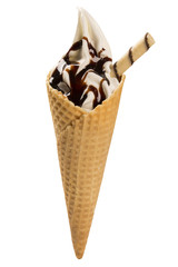 Vanilla ice cream with chocolate syrup in cone