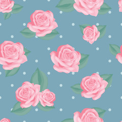 Pink roses with leaves on vintage blue polka dot background.