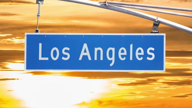 Los Angeles Street sign with time lapse sunset and zoom in Southern California.