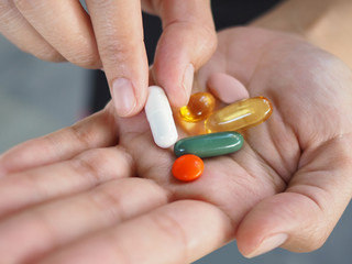 Vitamin in woman's hand
