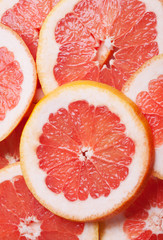 close up of grapefruit slices background