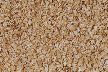 oat flakes photo, rolled oats, oat background. oatmeal photo, dry oatmeal, oatmeal grains