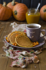 Pumpkin pancakes with sea buckthorn sauce for breakfast  