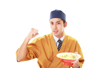 ガッツポーズのラーメン職人