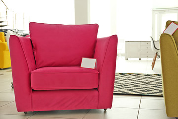 Pink armchair for sale in furniture store