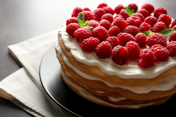 Tasty raspberry cake on plate, closeup