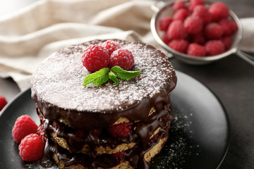 Tasty raspberry cake on plate, closeup