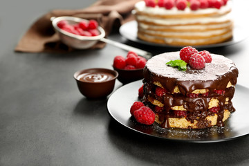 Tasty raspberry cake on grey background