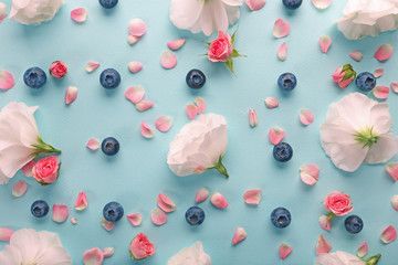 Tender pattern made of blueberries and flowers