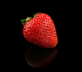 Fresh strawberry on black background
