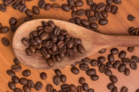 Coffee Beans into a spoon