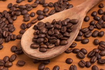 Coffee Beans into a spoon