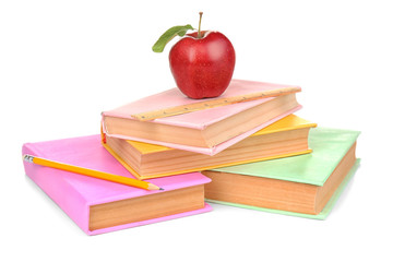 Books with pencil and apple, isolated on white. Back to school concept