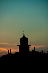 Church silhouette with people