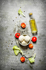 Mozzarella with olive oil, tomatoes and spices.