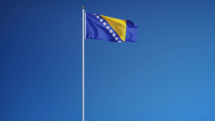Bosnia and Herzegovina flag waving against clean blue sky, long shot, isolated with clipping mask alpha channel transparency, perfect for film, news, digital composition