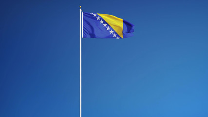Bosnia and Herzegovina flag waving against clean blue sky, long shot, isolated with clipping mask alpha channel transparency, perfect for film, news, digital composition