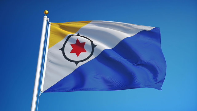 Bonaire flag waving against clean blue sky, close up, isolated with clipping mask alpha channel transparency, perfect for film, news, digital composition