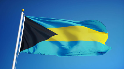 Bahamas flag waving against clean blue sky, close up, isolated with clipping mask alpha channel transparency, perfect for film, news, digital composition
