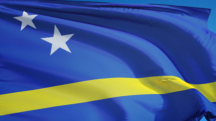 Curacao flag waving against clean blue sky, close up, isolated with clipping mask alpha channel...