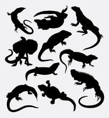 Lizard reptilian animal silhouette. Good use for symbol, logo, web icon, sticker, sign, mascot, or any design you want.