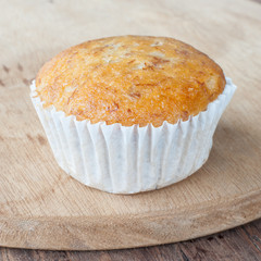 Homemade cupcake banana on the wooden table
