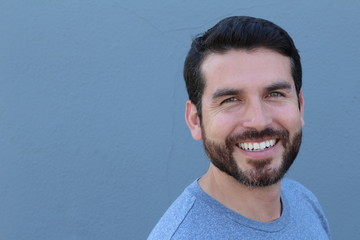 Fototapeta premium Happy stubble guy in blue, portrait