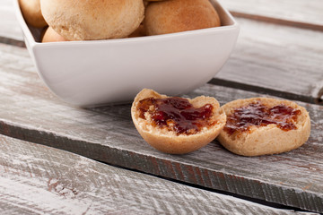 Fresh homemade whole wheat dinner rolls with pluot jam