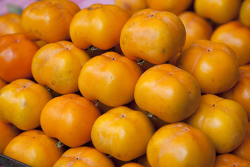Orange persimmon in market