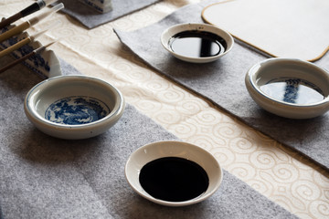 Fototapeta na wymiar chinese calligraphy tools on table