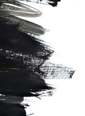 black brush strokes on white paper