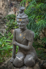 Contortionist hermit  statue in wat pho , Bangkok Thailand.