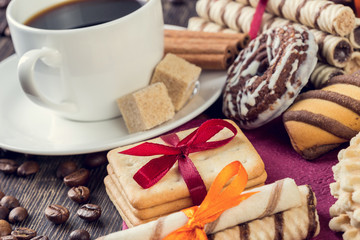 Assorted cookies and cup of coffee
