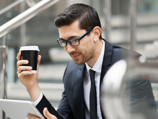 Portrait of handsome businessman outdoor