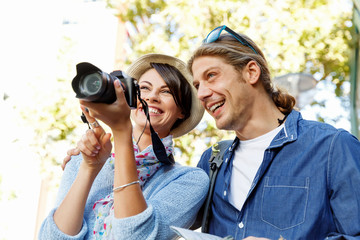 Smiling couple with the camera