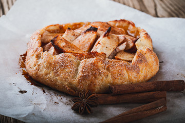 Homemade galette, crusty rustic pie with apples and cinnamon