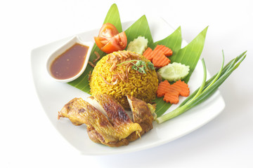 Chicken biryani with green chutney isolated on white background
