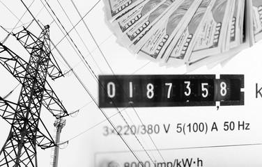 High voltage tower lines, electric meter display and american dollars.