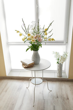Beautiful flower bouquets in modern interior