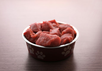 Healthy dog food on wooden background