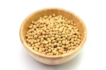 soybeans in wooden bowl isolated on white background