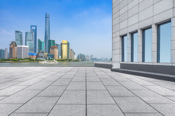 abstract building wall with city skyline background,shanghai,china.