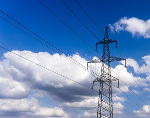 High voltage electricity pylon system on the sky background
