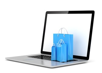 laptop and  shopping pags on white background. 3d rendering.