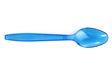 Plastic spoon on a white isolated background