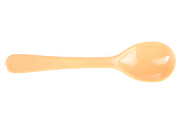 Plastic spoon on a white isolated background