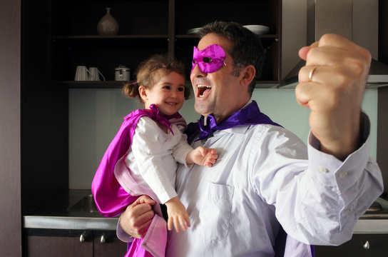 Happy Superhero Father And Child